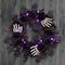 24" Bad to the Bone Black Flower & Skeleton Hand Halloween Pre-Lit LED Wreath